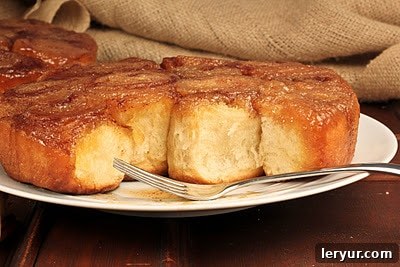 Stacked Maple Syrup Sticky Buns ready to be enjoyed