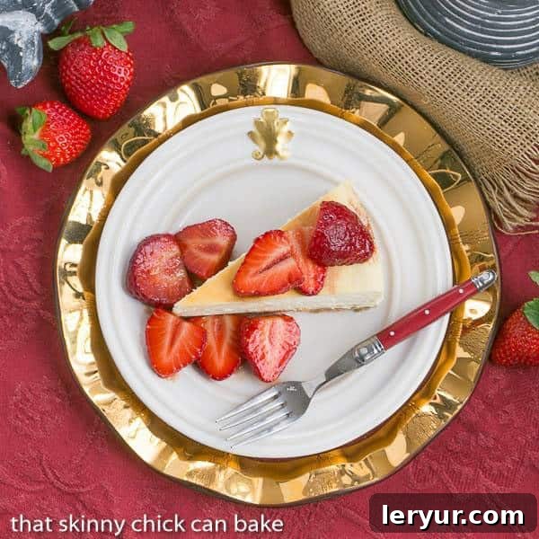 Berry Bliss: 50+ Irresistible Dessert Ideas 6 Decadent Mascarpone Cheesecake topped with glistening balsamic strawberries, served on a white plate.