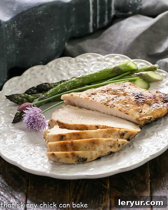 Mustard, Garlic, and Lime Marinated Chicken Breasts, perfectly grilled with a golden-brown sear.
