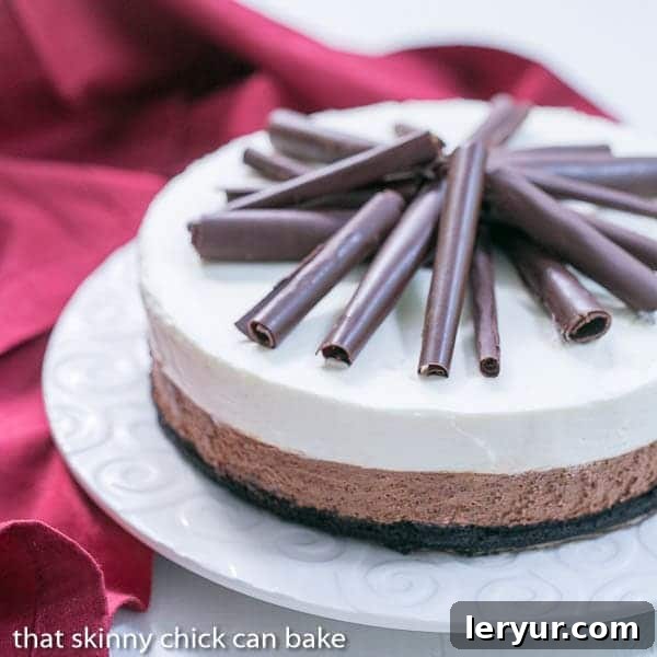 Triple Chocolate Mousse Pie on a white serving plate with a red napkin.