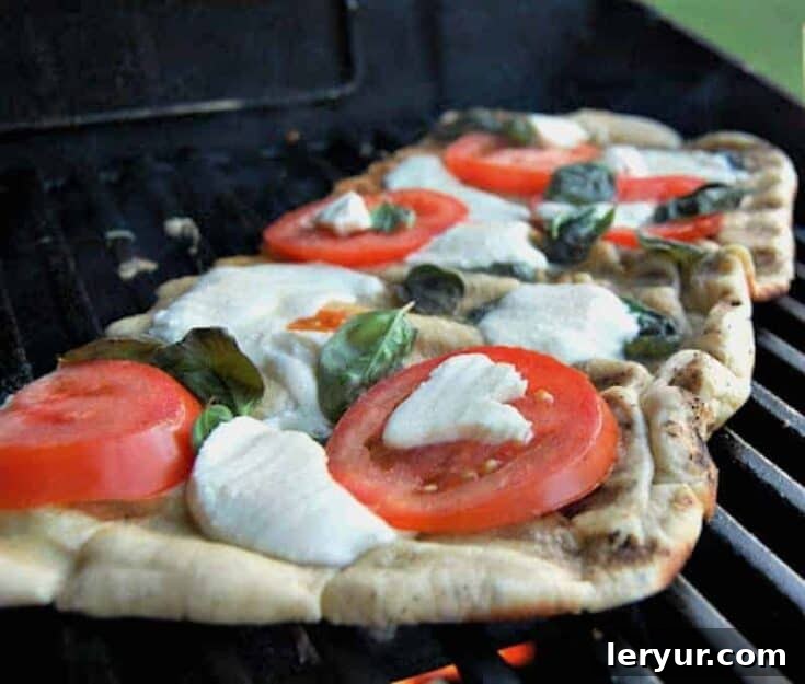 Grilled Margherita Pizza, featuring classic tomato, mozzarella, and basil.