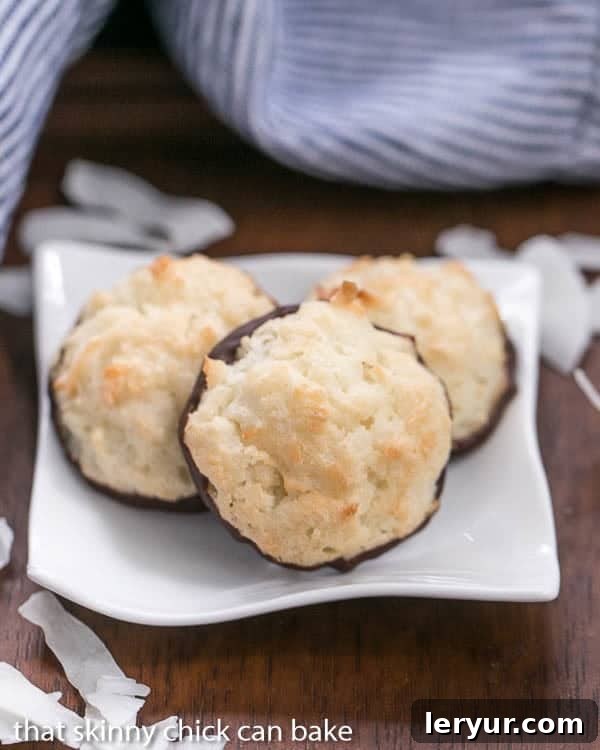 Chocolate Dipped Coconut Macaroons | Light and scrumptious with a crisp exterior and chewy middles!