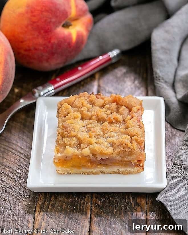 A fresh peach bar on a square white plate