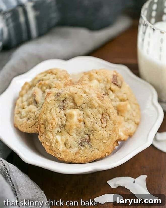Golden Toffee and White Chocolate Dream Cookies 2 A white bowl full of white chocoate toffee chunk cookies