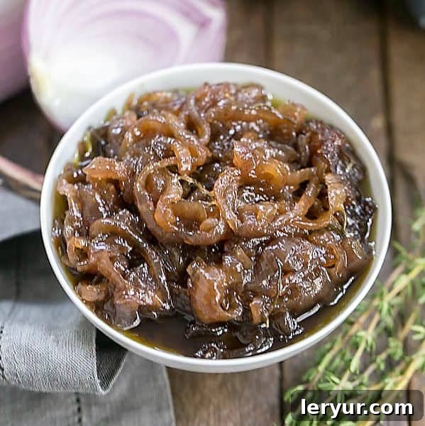 French Onion Marmalade - A French-inspired condiment that elevates any grilled burger or sandwich! Rich, glistening French Onion Marmalade in a white ceramic bowl, ready to be served as a gourmet condiment.