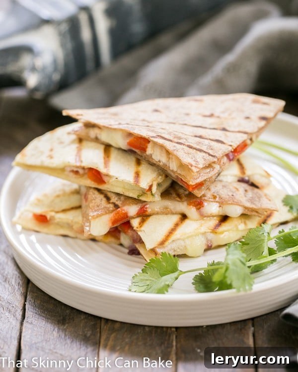 Spicy Pork Quesadillas: An easy Tex-Mex dish that's perfect for a weeknight dinner, game day snacking and more!