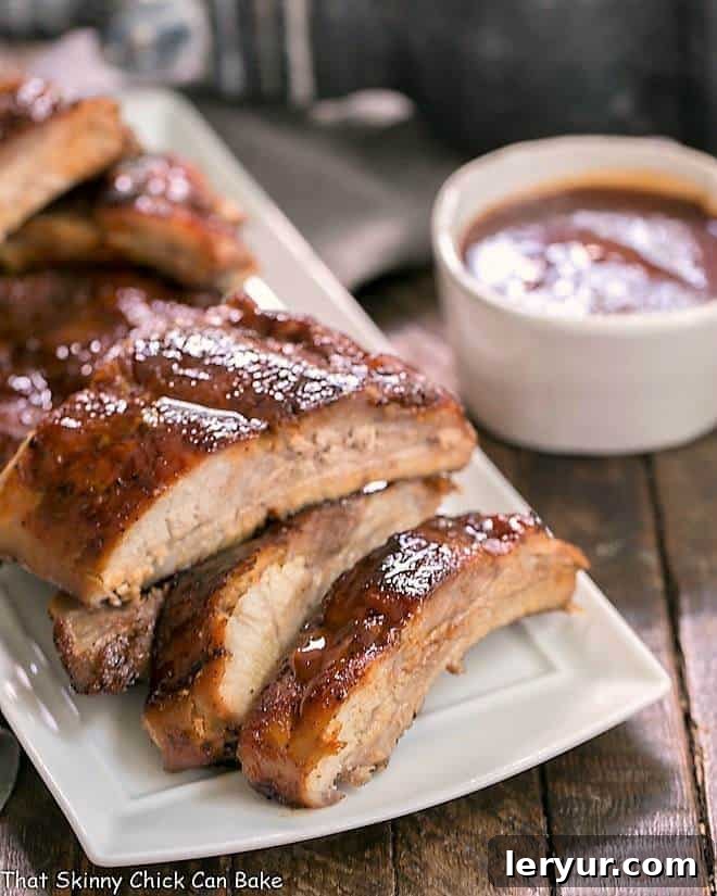 Tender, fall-off-the-bone baby back ribs cooked in an Instant Pot and finished in the oven, glazed with BBQ sauce.
