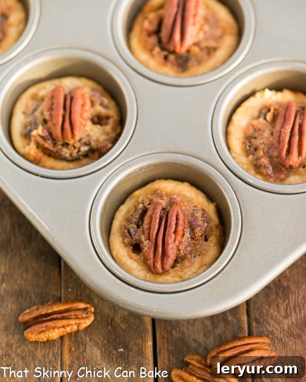 Pecan Tassies - Mini Pecan Pies that are perfect for a bite sized dessert! Mini Pecan Pies perfectly baked in a mini muffin tin, golden-brown and ready to be enjoyed.