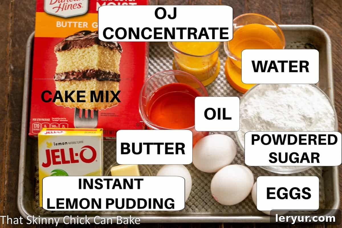 All the ingredients for the Easy Lemon Bundt Cake and its glaze, neatly arranged on a sheet pan with clear labels.