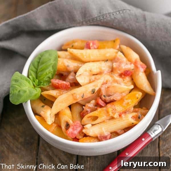 Cheesy Baked Pasta | Creamy pasta with 3 cheeses, basil and prosciutto