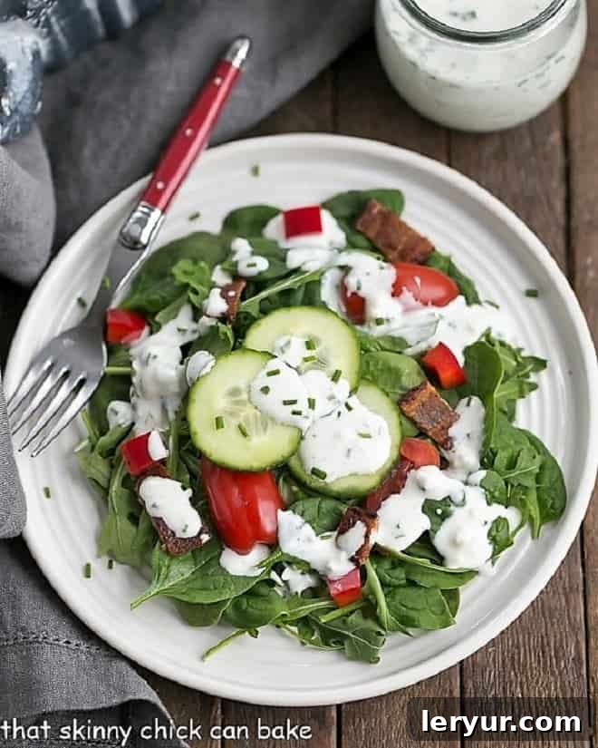 Best Blue Cheese Dressing - Transform simple greens into something amazing with a creamy, flavorful salad dressing! Overhead view of the Best Blue Cheese Salad Dressing on a green salad