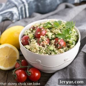 quinoa tabbouleh in a white bowl with parsley garnish