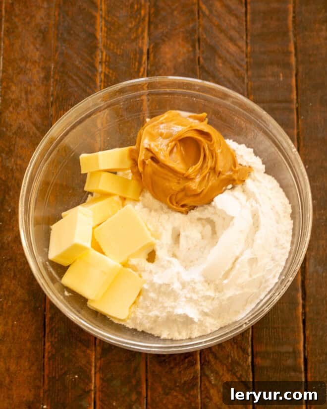 Irresistible Peanut Butter Truffle Brownies 9 Ingredients for the peanut butter truffle filling in a bowl.