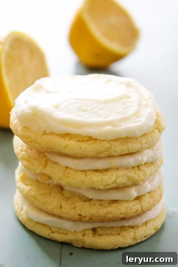 Soft and chewy lemon sugar cookies arranged appealingly.
