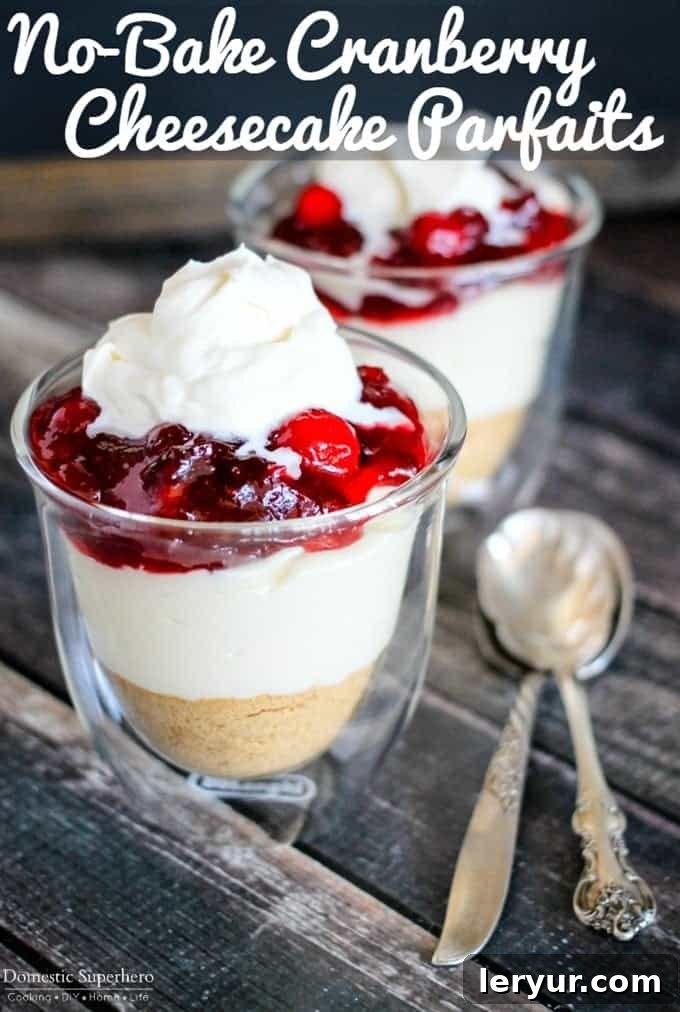 Elegant No-Bake Cranberry Cheesecake Parfaits, ideal for a Christmas buffet.