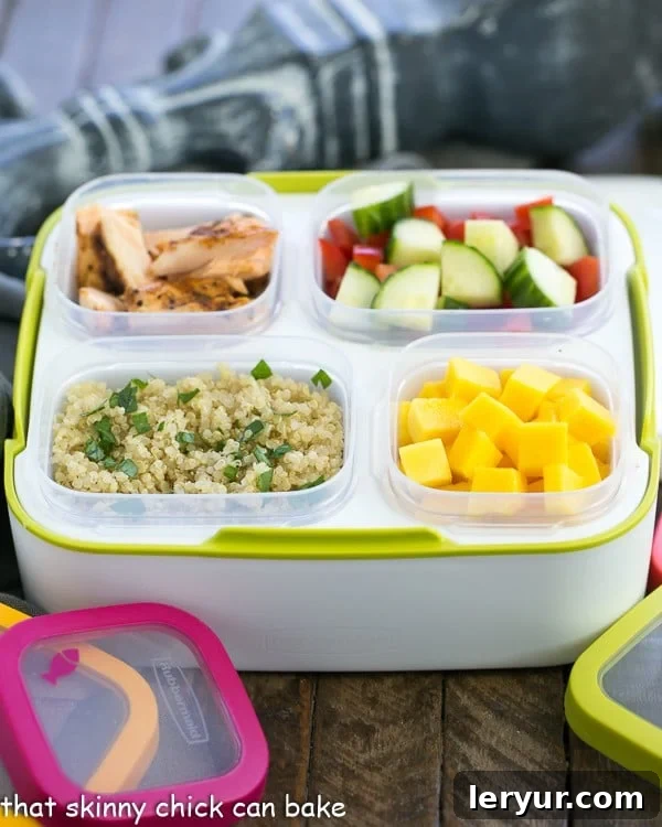 Caribbean Salmon Quinoa Salad - Perfectly portioned, healthy salad with quinoa, mangoes, jerk seasoned salmon and vegetables! Caribbean Salmon Quinoa Salad in a Balance Meal Kit