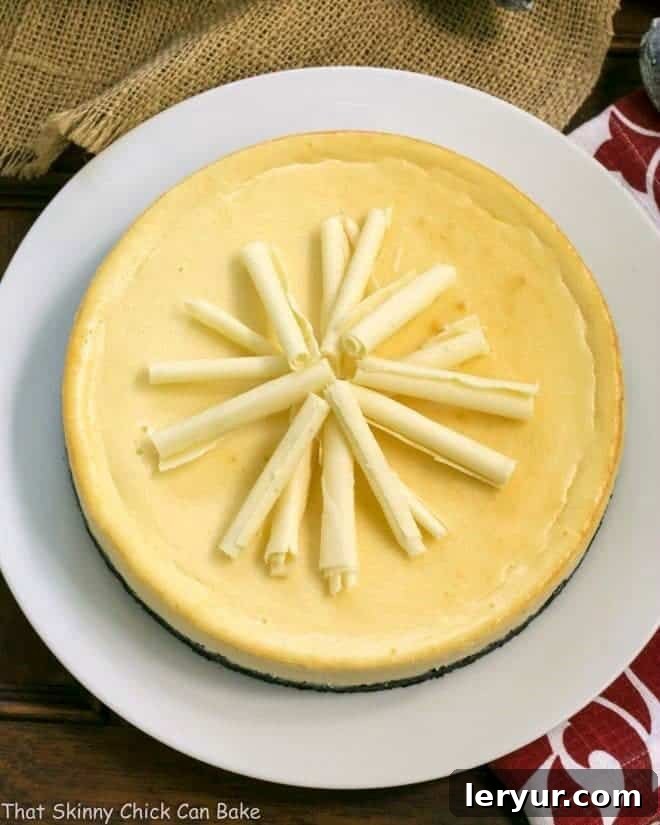 Decadent white chocolate Frangelico cheesecake with a chocolate cookie crust.