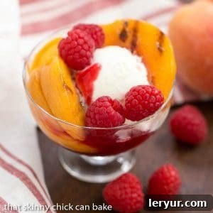 Grilled Peach Melba, a twist on the classic made with grilled peaches.