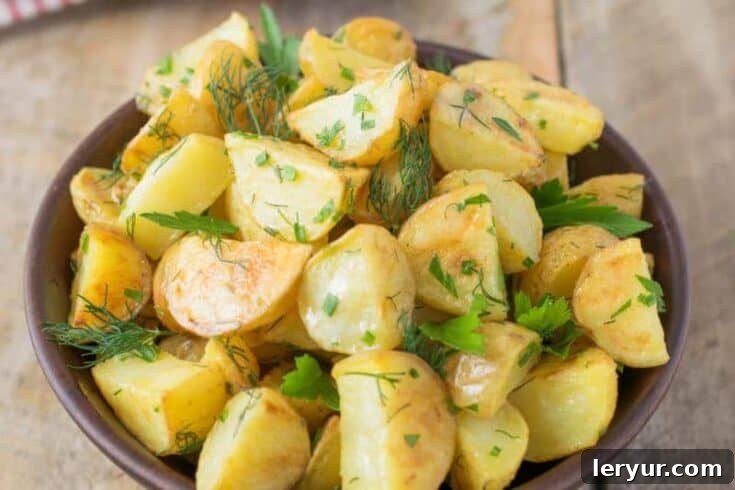 Roasted Potato and Herb Salad, a unique twist on potato salad with roasted potatoes and fresh herbs.