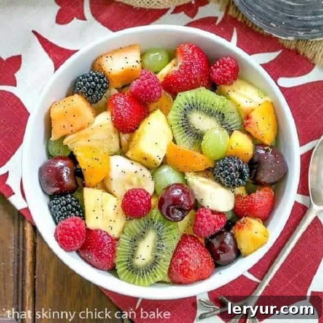 Honey Lime Fruit Salad, a vibrant and refreshing mix of seasonal fruits with a sweet and tangy honey-lime dressing.