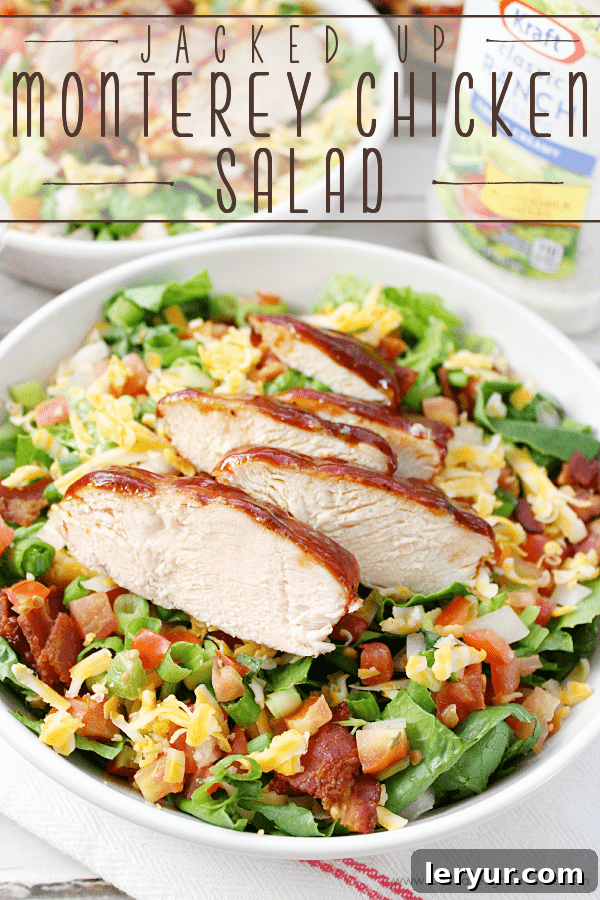 Jacked-Up Monterey Chicken Salad, a hearty salad topped with BBQ chicken, bacon, and cheese.