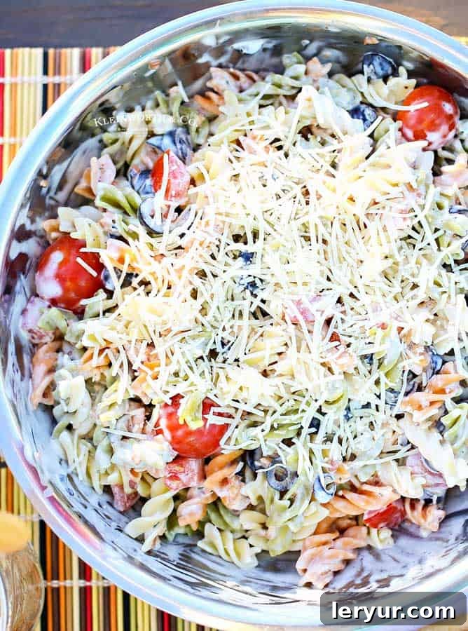 Parmesan Ranch Pasta Salad, a delicious potluck pasta salad with olives, bacon, tomatoes, and ranch dressing.