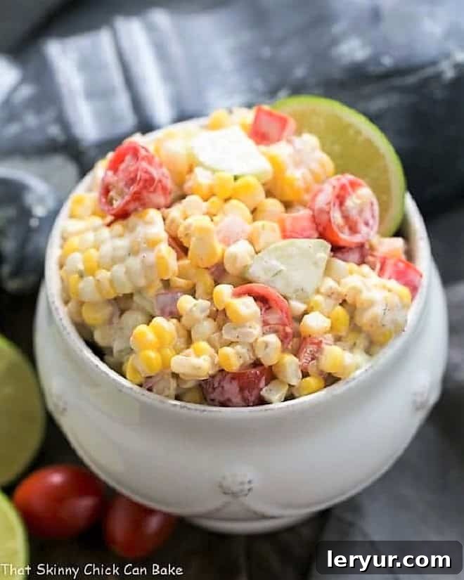Spicy Mexican Corn Salad, featuring roasted corn, fresh cilantro, chili powder, and creamy cotija cheese.