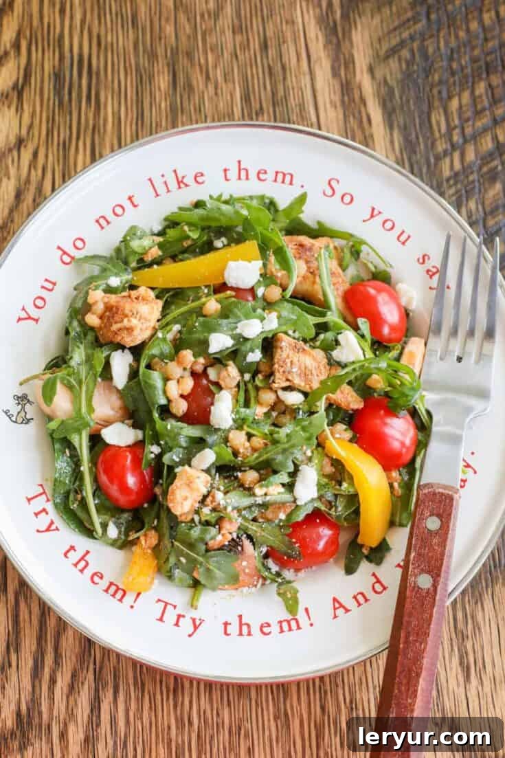 Couscous Chicken Salad, a hearty and flavorful salad with Israeli couscous, tender chicken, and fresh vegetables.