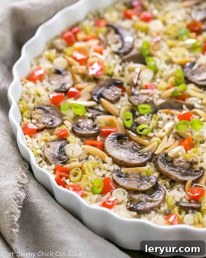 Italian Rice Pilaf with Toasted Almonds in a shallow casserole dish, ready to serve.