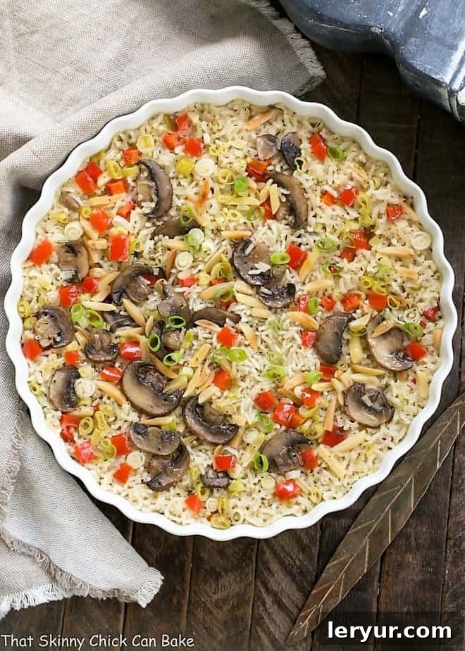 Overhead view of Italian Rice Pilaf in a round casserole dish, garnished and ready to be enjoyed.