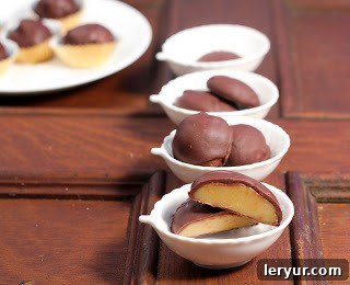 Homemade truffles and chocolate covered caramels presented in small bowls