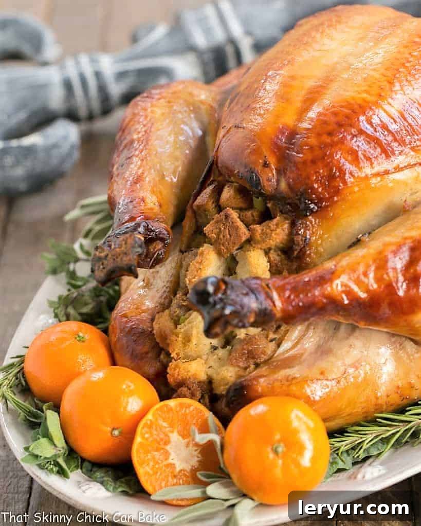 Honey Brined Turkey Recipe - The Ultimate Guide to a Succulent Holiday Turkey A beautifully roasted Honey Brined Turkey on a pristine white serving platter, ready to be carved for a festive gathering.