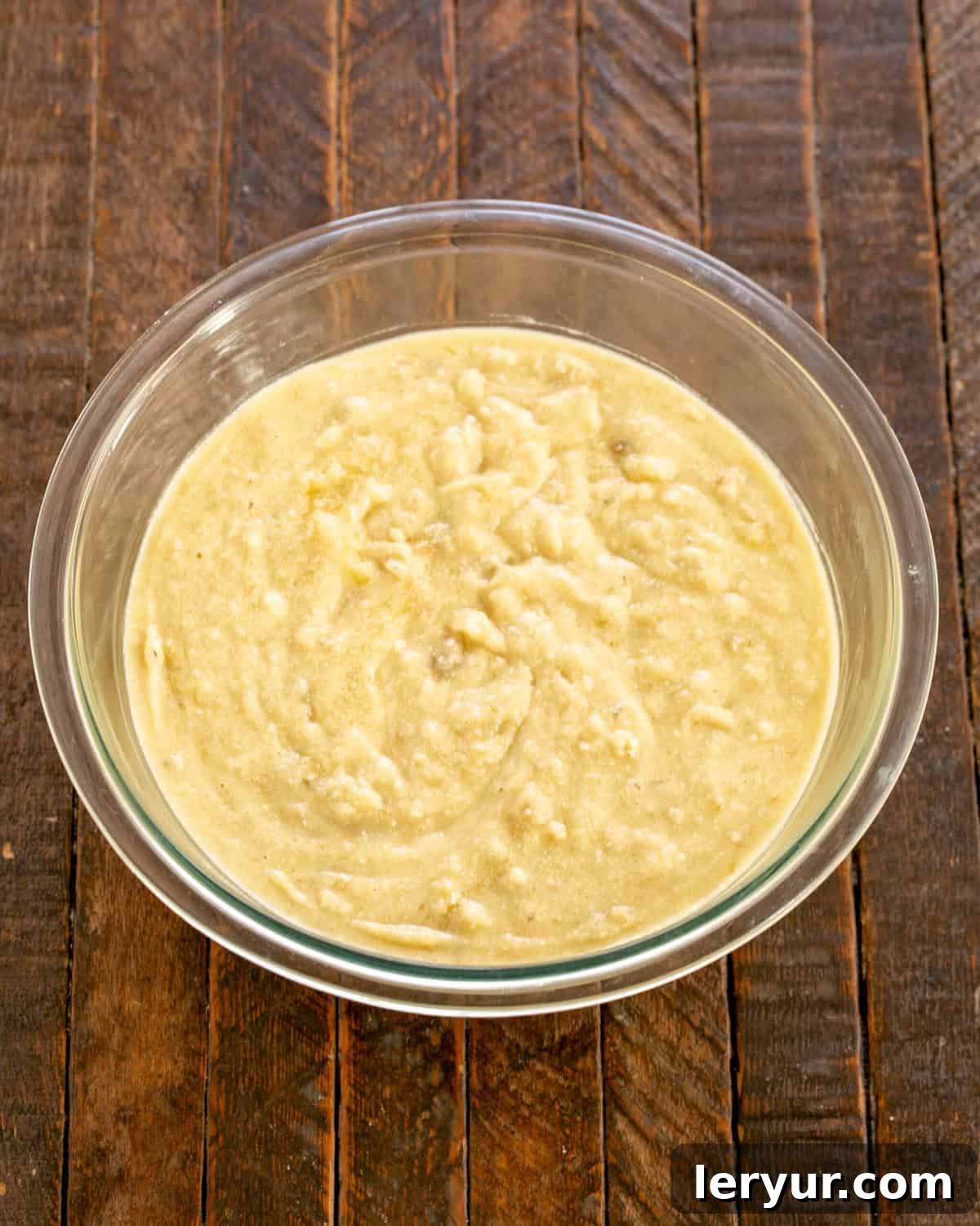Velvety Buttermilk Banana Bread 6 Dry ingredients being whisked separately and then gently folded into the wet ingredients.