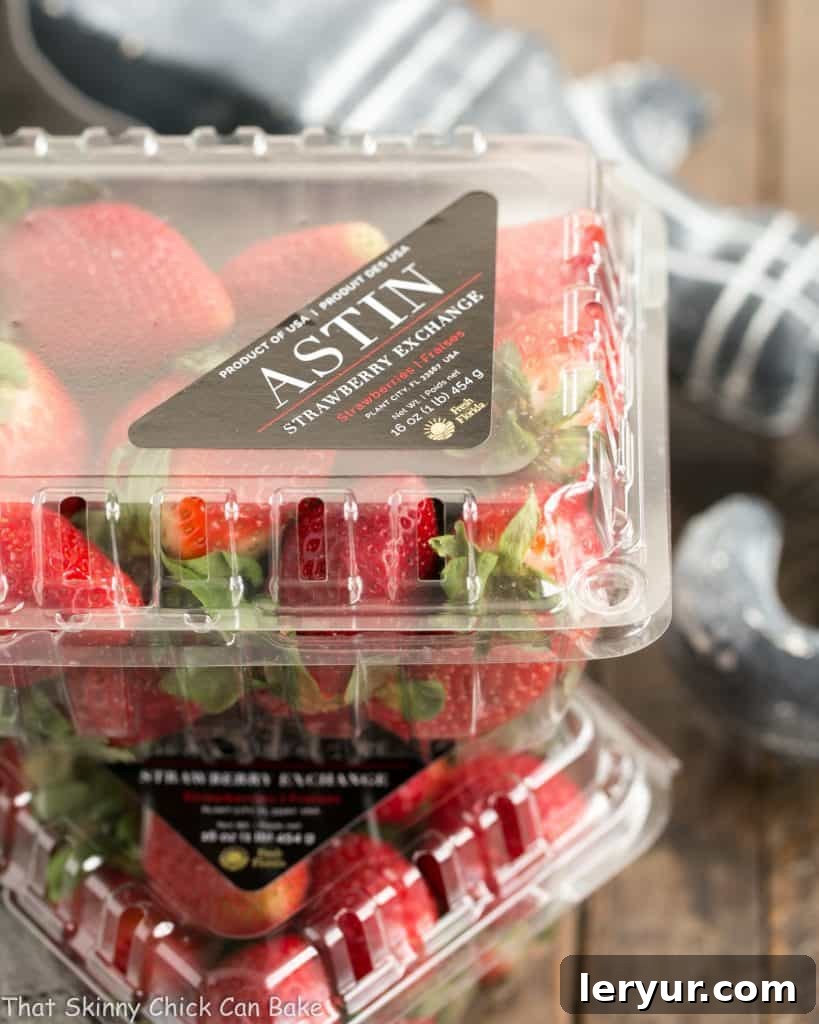 Strawberry Glazed Salmon - Roasted salmon brushed with a tasty, multifaceted strawberry sauce! Two boxes of fresh strawberries