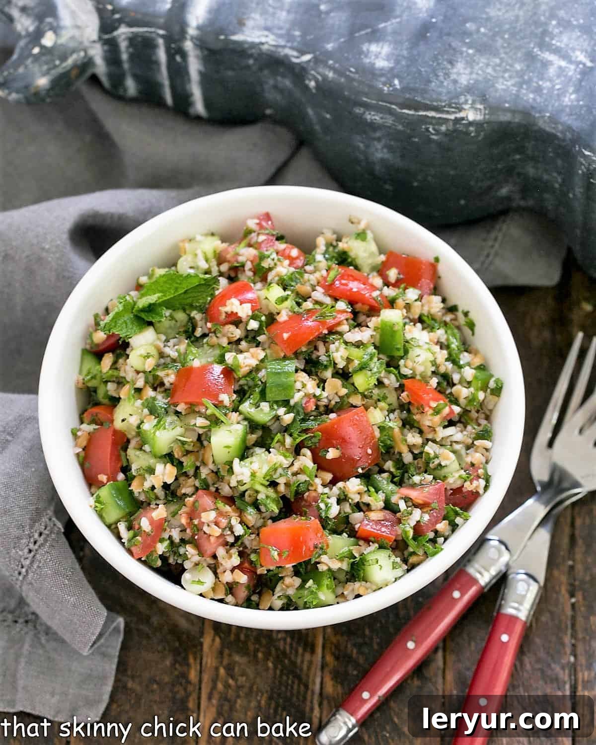 Mastering Classic Tabbouleh 3 Overhead view Tabbouleh in a white serving bowl.