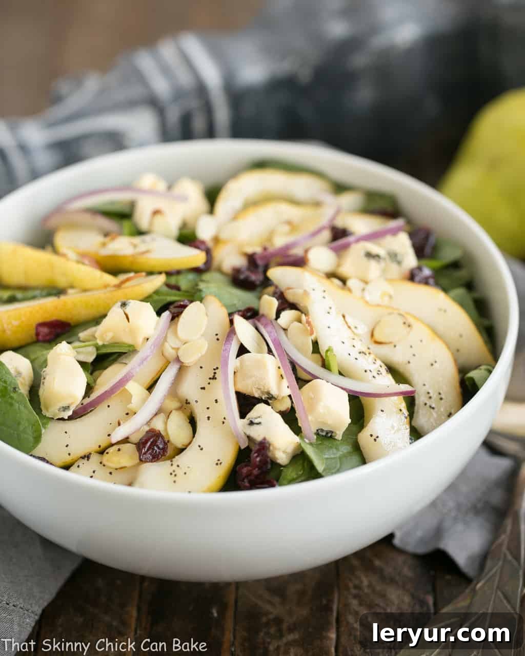 Gourmet Pear Cranberry and Blue Cheese Salad 4 Spinach Pear Salad with Cranberries and Blue Cheese | A terrific autumn or winter salad with an out of this world salad dressing!