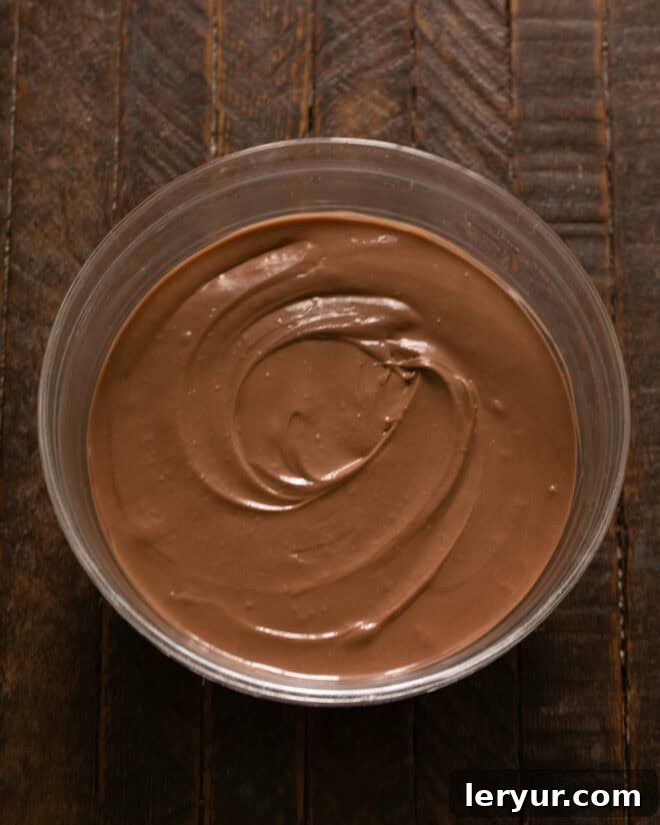 Step 2: Mix in fudge sauce. Taste and add more if desired.