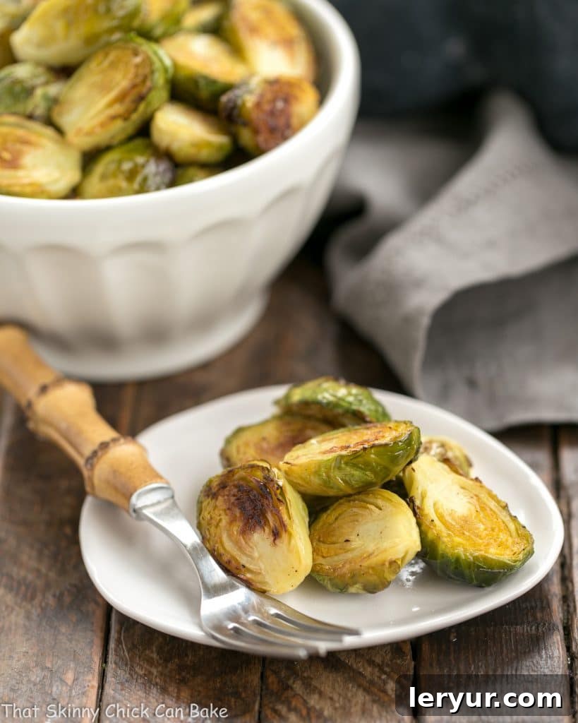 Close-up of Honey Mustard Roasted Brussels Sprouts on a small white plate