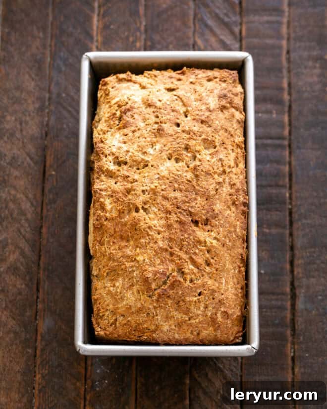 Effortless Traditional Irish Soda Bread 7 Baked Irish Brown Bread cooling on a wire rack.