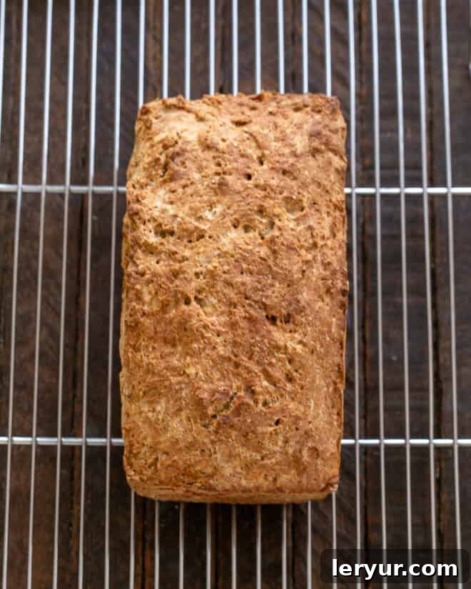 Effortless Traditional Irish Soda Bread 8 Baked Brown Bread cooling on a rack, showing its golden-brown crust.