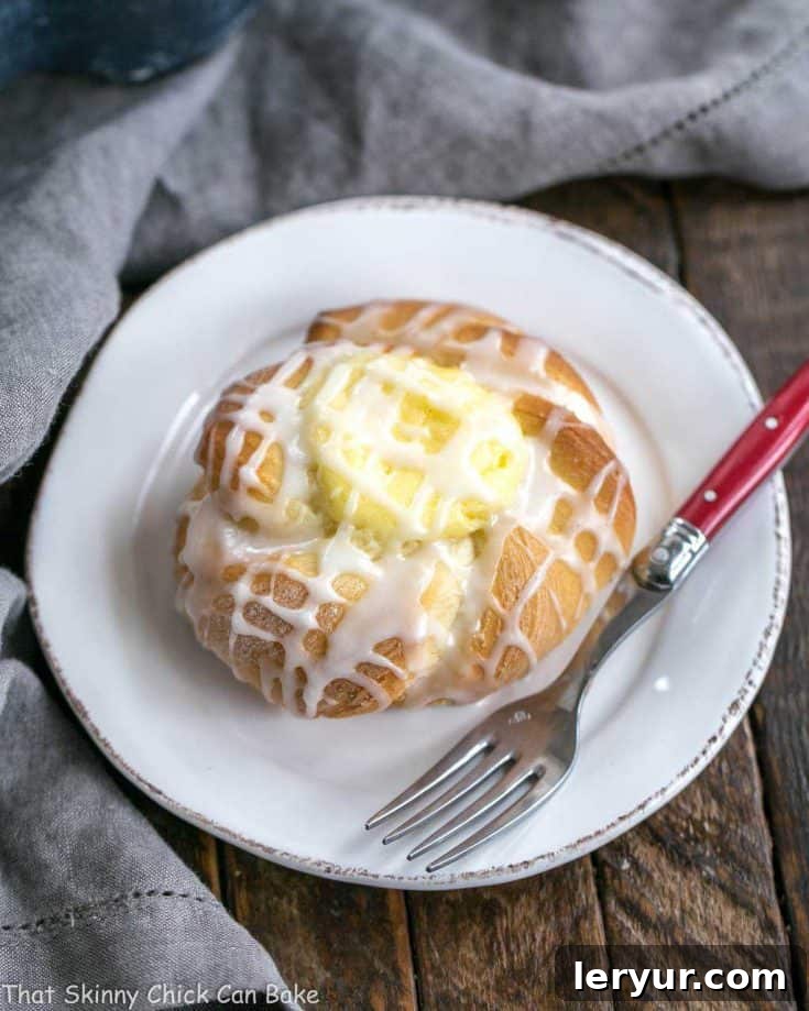 Danish Twists with Cream Cheese Filling, beautifully golden with a sweet glaze.