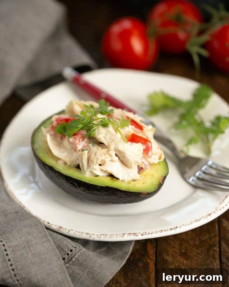 Southwestern Chicken Stuffed Avocados - Delicious, low-carb convenience food