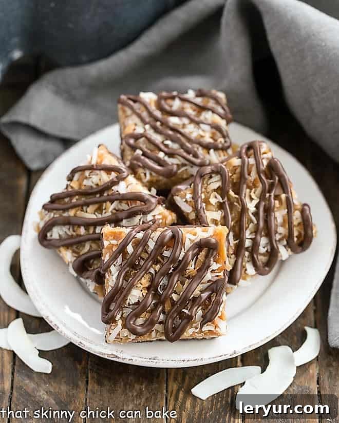 Homemade Samoa Bars on a round white plate