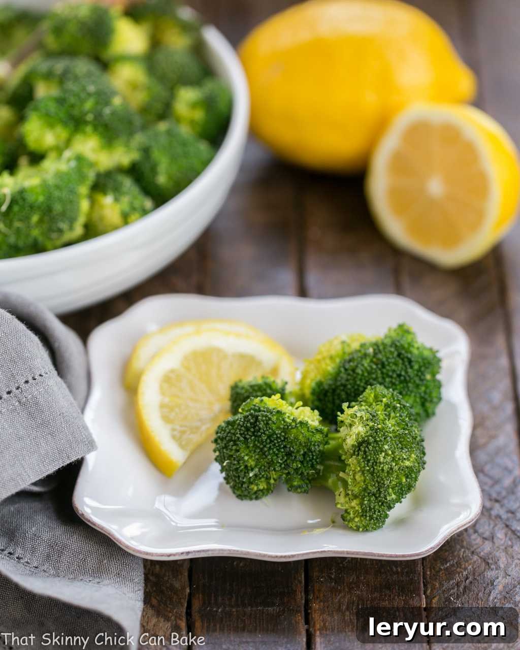 Vibrant Lemon Garlic Broccoli 3 A plate of food with broccoli, with Garlic and Lemon.
