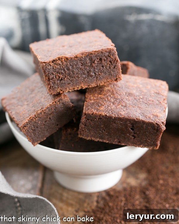 A close-up shot of a perfect Palm Beach Mocha Brownie in a white bowl, showcasing its rich, dark color and crisp top.