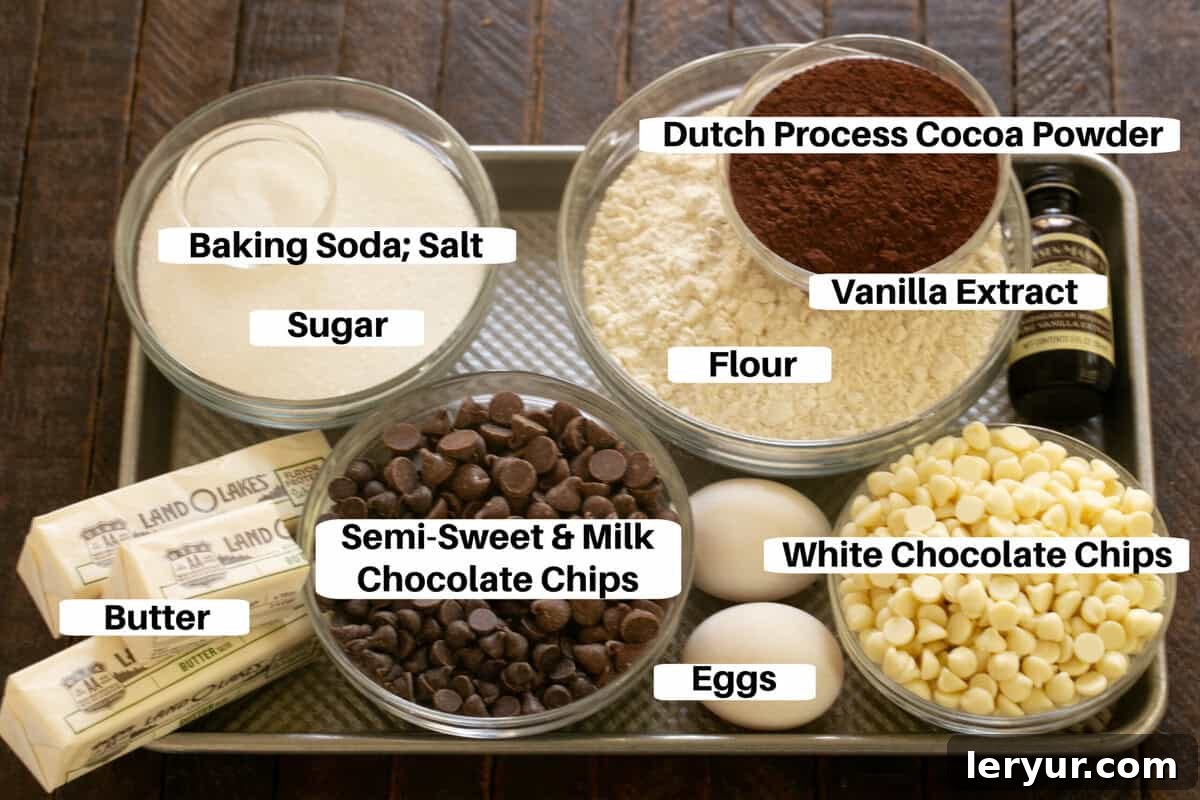 All the essential ingredients for Quadruple Chocolate Cookies laid out on a sheet pan with descriptive labels.