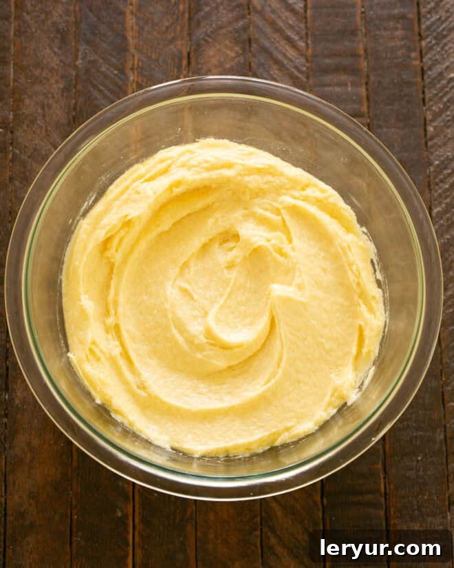 Step 1: Beat room temperature butter and sugar until light and fluffy in a large mixing bowl.