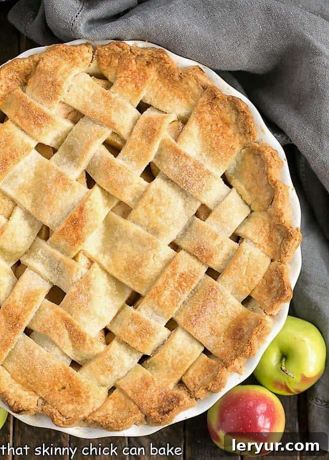 Best Apple Pie Recipe - A cinnamon spiced apple pie with a flaky lattice crust! A couple tricks make this the best recipe for a classic apple pie! Overhead view of Perfect Apple Pie.