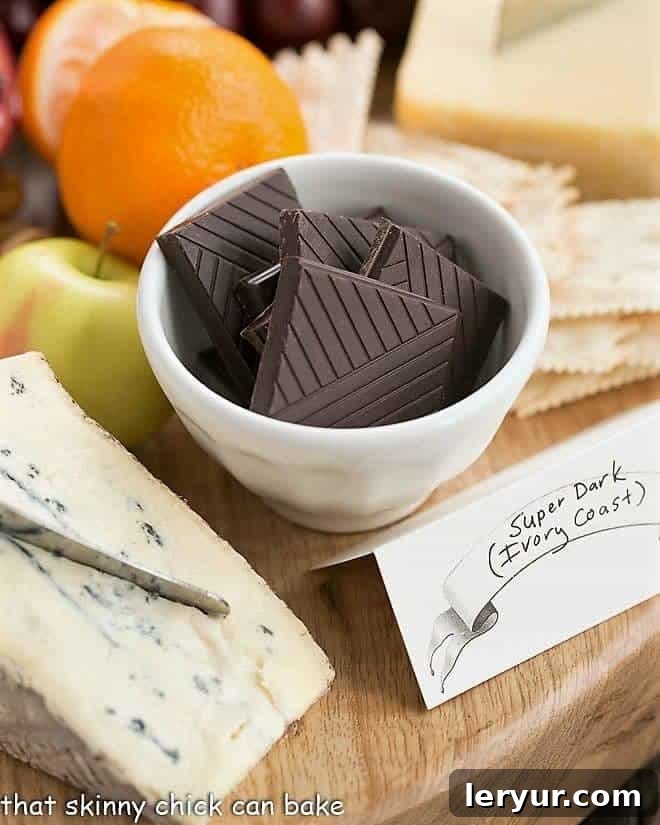 Chocolate squares in a white bowl with blue cheese