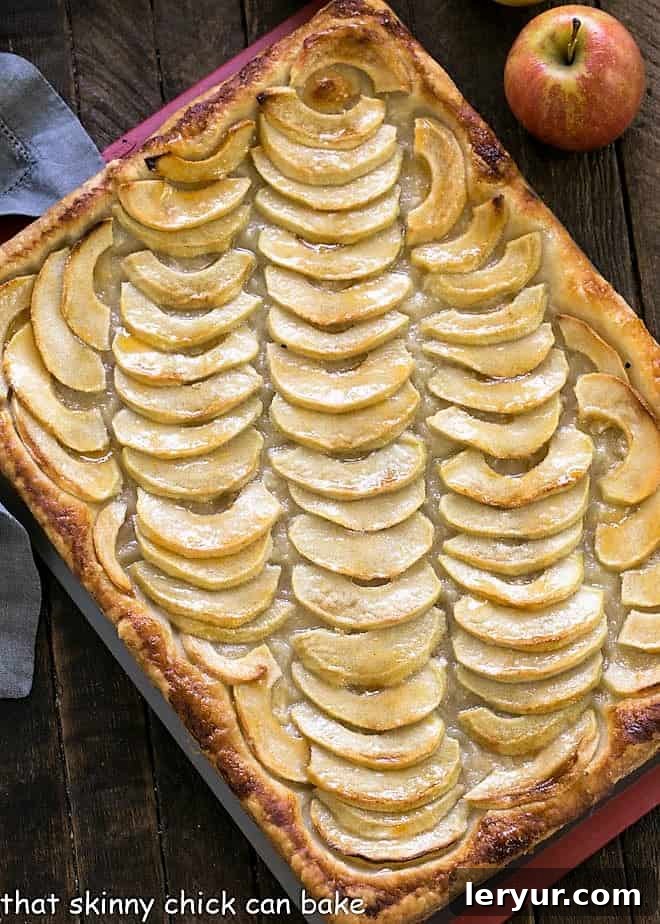 Overhead view of a beautiful platter of Easy, buttery French Apple Tart, perfectly golden and ready to be served.